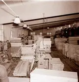 I samband med att byggandet av hyreslägenheter tog fart under 1950-talet började byggmästare Ivar Tegnander tillverka egna köksutrustningar. Verksamheten expanderade och under 1960-talet bildades AB Standardsnickerier, senare Kalmarkök, som tillverkade köksinredningar för såväl flerbostadshus som villor. Verksamheten bedrevs i kvarteret Giraffen. När den upphört övertogs lokalerna av Kooperativa Förbundet som öppnade Obs! stormarknad.