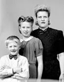 Firman Ad. Lidwall i Tidaholm etablerades 1862. Mivis Lidwall f. 1856 och Adolf Lidwall drev den tillsammans med sin dotter Signe.