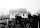 Familjen Johan och Hilda Andersson med sönerna Erik och Hilmer Johansson, Uddagården, Bolum.