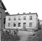 Skara. 
Kvarteret Jupiter nr. 12, 13.
Skolgatan 13. Flygeln, östra fasaden.