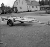 Gåva av Thure Elgåsens sterbhus. 
Thure Elgåsen. f. 26/6-1910 d. 6/9-1985. 
Tivedenkännare, konsthantverkare, scoutledare och hembygdsföreningsman.