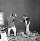 Skara. Museet. Rappning av vägg i Kråks flyglar 1967.