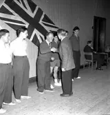 Skara. Bordtennis; Engelska BT-spelare gästar Skara BTK 22/1 1953.

Skara Bordtennisklubb