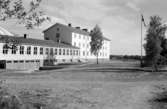 Exteriör 1948.
Skara lantmannaskola. 1884-. Huvudman bla Hushållningssällskapet till 1958, därefter landstinget. Flyttad till Uddetorp 1943.