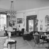 Hemma hos köpmannen och djäknebeskyddaren Georg Wilson.
Heminteriör.
1958.