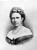 Drottning Lovisa.

Lovisa, 1828-71, svensk och norsk drottning från 1859, dotter till prins Fredrik av Nederländerna och Lovisa av Preussen. 
http://www.ne.se/jsp/search/article.jsp?i_art_id=244858