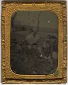 Troligen Maria Forssell med barn.
Ambrotyp monterad i ram av reliefpressad mässing.