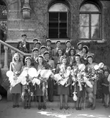 Real i Borgarskolan och Handelsskolan.
Avgångsklasserna i Flickskolan. 1941