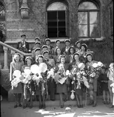 Real i Borgarskolan och Handelsskolan.
Avgångsklasserna i Flickskolan. 1941