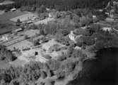 Flygfoto över Ramkvilla i Vetlanda kommun. Nr. M. 940