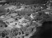 Flygfoto över Ramkvilla i Vetlanda kommun. Nr. M. 940