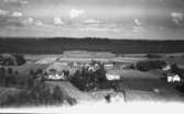 Flygfoto över Bondstorp i Vaggeryd kommun. Nr. H. 1940.