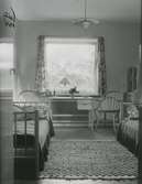 Interiör från Ungkarlshotellet på Mariagatan, byggt 1943. Inredning av arkitekt Olle Thunström och textilkonstnärinnan Edna Martin.