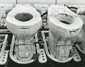 Detaljbild, Sanitetsporslinsfabriken. Gjutformar i gips för wc-stolar.