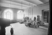 Tappningsrummet i bottenvåningen, Sprithandelsbolaget, Uppsala 1909