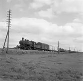 Statens Järnvägar, SJ E 1043 med tåg.
Tåg 5596.