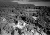 Flygfoto över Stengårdshults kyrka i Gislaveds kommun. Nr H 1942