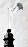 Stadshotellet flaggar med Domus flagga vid invigningen av Domusvaruhuset, den 10 september 1964.