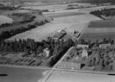 Flygfoto över Drättinge Gård i Skärstads socken, Jönköpings kommun. Nr H 2580