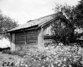 Baksidan av en bod vid Lilla Björkekulla, Lundboholm, Värnamo.