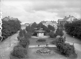 Utsikt från stationshuset över järnvägsparken och staden. Vattenbutik