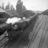 Marma-Sandarne järnvägs bangård i Askesta vid Askesta ångsåg. Marma - Sandarne Järnväg, MaSJ lok 3.