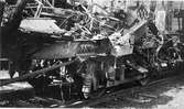 Krylbosmällen. Vagnsskrot efter explosionen av ett tyskt ammunitionståg vid Krylbo järnvägsstation den 19 juli 1941.