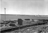 Luleå stad fotograferad från Svartön. Bilden användes vid Malmbanans utställning 1937.