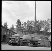 Kaelble lastbil med vagnbjörn lastad med tankvagn SJ Q12 506064.