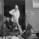 Statens Järnvägar, SJ Tåghem, resenärer vid skidvagn.