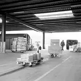 Omlastningsmagasin, kedjetransportör och godsbil