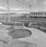 Trädgårdsanläggning med damm, SJ X0a5