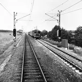 Infart till Moholm, sträckan Skövde-Hallsberg. SJ D lok