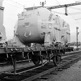 Statens Järnvägar, SJ Lbms. (fd Lbs). Vagn med Em-behållare vid Älvsjö station