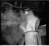 Gengasaggregat på baksidan av en buss.