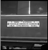 Skylt på en personvagn för internationell trafik.