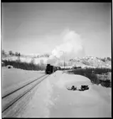 Gotståg i snölandskap.