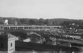 Järnvägsbro och lokstall vid Karlshamn station.