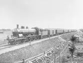 UGJ 23 med persontåg.
UGJ , Uppsala - Gävle Järnväg