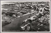Flygbild över Nyköping hamn med omnejd.
