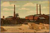 Fabriksbyggnader vid Hyllinge gruva. Kolorerat foto.