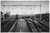 Abisko med Lapporten i bakgrunden 
Abisko 14 juni 1922  station och bangård med eltåg