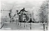 Stationen anlades 1879.
Pingstaftonens förmiddag 1910 brann stationen ned till grunden tillsammans med Hotell Drott, Lilla Hotellet och Järnvägshotellet. Stationsbyggnaden var från sitt ursprungliga skick påbyggd med en våning, samt en farstu norrut. 1912 stod det nya stationshuset färdigt. Intill dess användes en reservstation i en fastighet som tillhörde DJ och som låg vid spårområdet på södra sidan. 
DJ , Dalslands Järnväg