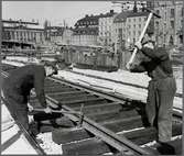 Bro och spårarbete Stockholm Central - Stockholm Södra.
Riddarholmen. Riddarhuset till vänster i bild.