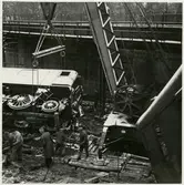 Urspårning av lok och kranarbete med ångkran vid Tomteboda.