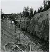 Rälsläggning vid inlandsbanans enda järnvägstunnel, strax utanför Jokkmokk. Sträckan Sorsele - Jokkmokk.