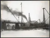 Dalälven vid Mora. Muddringsarbete vi bropelare nr 1.