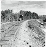 Statens Järnvägar, SJ Motordressin, nära bron över Skellefteälven längs norra stambanan, på linjen mellan Karsbäcken och Kusfors.