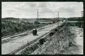 Packning av makadam på linjen mellan Sösdala och Tjörnarp.