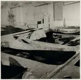 Skador på A-vagnens löpboggie efter olycka vid hållplatsen Arket 1951.